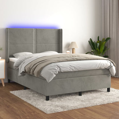 Box spring bed with mattress &amp; LED light grey 140x200 cm velvet