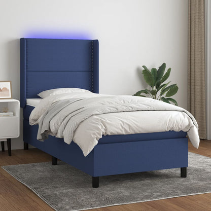 Box spring bed with mattress &amp; LED blue 90x200 cm fabric